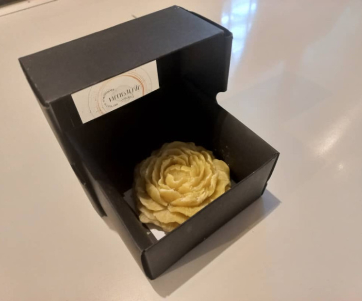 Flower-shaped soap in a box